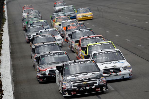 Elliottt Sadler leads a late restart in the inaugural NASCAR Camping World Truck Series Pocono Mountains 125 at Pocono Raceway in Long Pond, Pa. Credit: Todd Warshaw/Getty Images for NASCAR